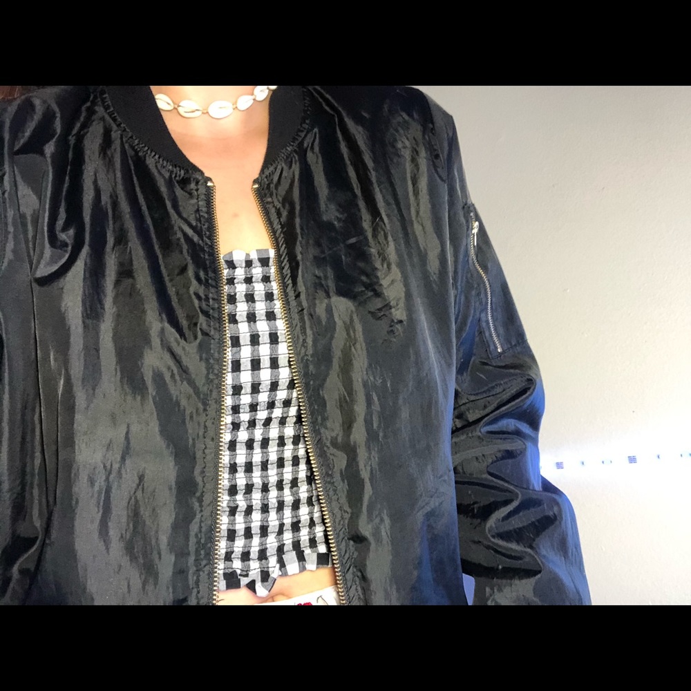 Large black bomber jacket, fits as medium.